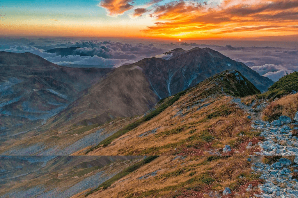 A peaceful mountain view at sunset, symbolizing the power of thought and the beauty of a positive mindset.